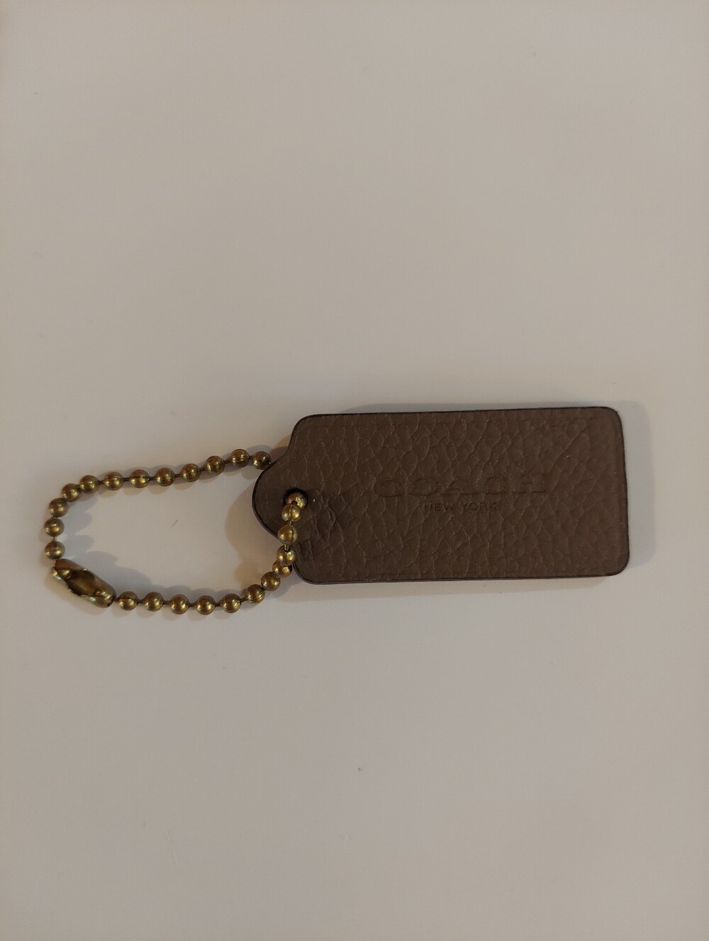 Coach Brown Hang Tag